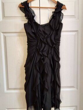 Black evening cocktail dress by Catchet.